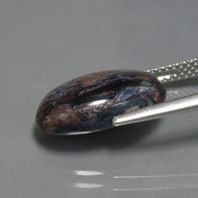 4.65カラットの天然マルチカラーピーターサイト、楕円形、オペーク