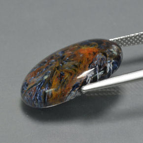 10.12カラットの天然マルチカラーピーターサイト、オーバルカット、オペーク