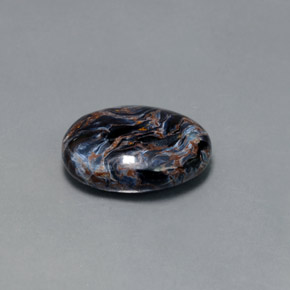7.11カラットの天然マルチカラーピーターサイト、オーバルカット、オペーク