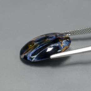 6.54カラットの天然マルチカラーピーターサイト、オーバルカット、オペーク