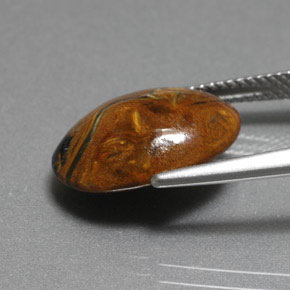 6.36カラットの天然マルチカラーピーターサイト、オーバルカット、オペーク