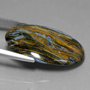 26.41カラットの天然マルチカラーピーターサイト、オーバルカット、オペーク