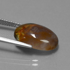 7.21カラットの天然マルチカラーピーターサイト、オーバルカット、オペーク