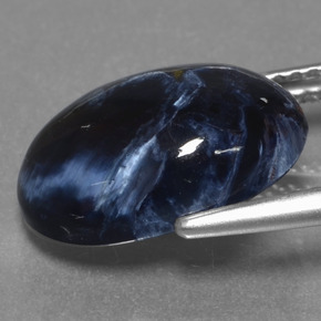 5.07カラットの天然マルチカラーピーターサイト、オーバルカット、オペーク