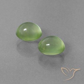 Shop natural 5.11ct ミディアムグリーン プレナイト gems, 楕円形, from 南アフリカ at GemSelect. In stock, global shipping!