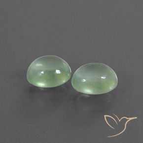 Shop natural 2.56ct 薄いイエローグリーン プレナイト gems, 楕円形, from 南アフリカ at GemSelect. In stock, global shipping!