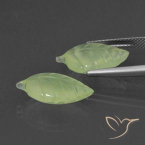 Shop natural 12.86ct 薄いペアーグリーン プレナイト gems, ファンシー, from 南アフリカ at GemSelect. In stock, global shipping!