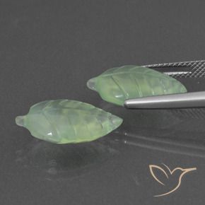 Shop natural 11.91ct 薄いイエローグリーン プレナイト gems, ファンシー, from 南アフリカ at GemSelect. In stock, global shipping!