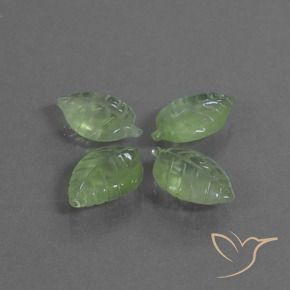 Shop natural 24.53ct イエローグリーン プレナイト gems, ファンシー, from 南アフリカ at GemSelect. In stock, global shipping!