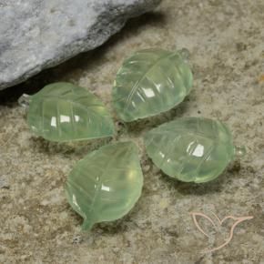 Shop natural 25.87ct 薄いペアーグリーン プレナイト gems, フラワーカット, from 南アフリカ at GemSelect. In stock, global shipping!