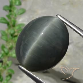 8.57カラットの天然濃い灰色クォーツキャッツアイ、オーバルカット、オペーク