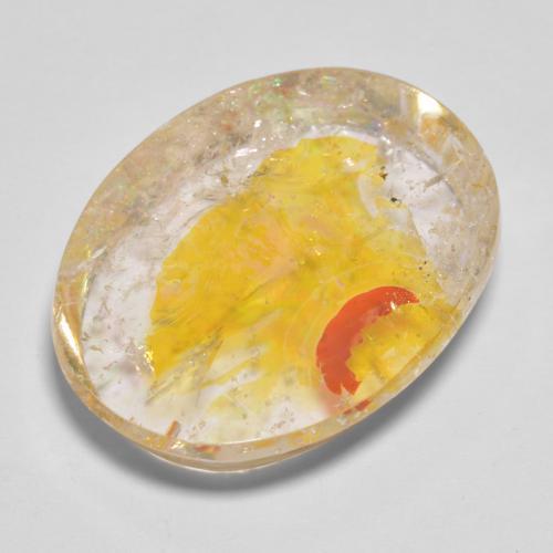 22.71カラットの天然ゴールデンイエローマーカサイト入りクォーツ（22.5×17.3 mm・オーバルカット）