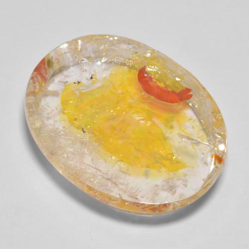 22.71カラットの天然ゴールデンイエローマーカサイト入りクォーツ（22.5×17.3 mm・オーバルカット）