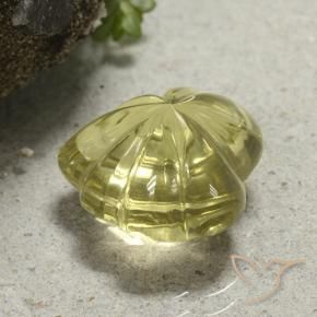 9.86カラットの天然ミディアム薄いイエロー石英、フラワーカット、透明