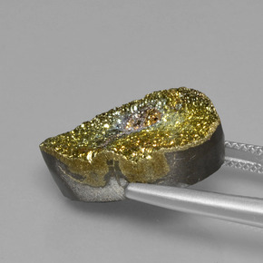 12.80カラットの天然マルチカラーレインボーパイライト（19.6×12.2 mm・オーバルカット）