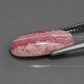 5.85カラットの天然マルチカラーロードクロサイト、オーバルカット、オペーク