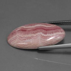 11.55カラットの天然マルチローズピンクロードクロサイト（24.9×12.2 mm・オーバルカット）