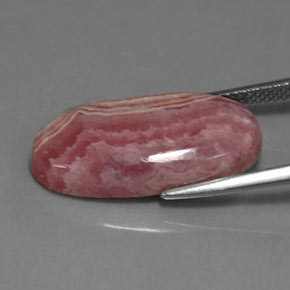 13.76カラットの天然マルチローズピンクロードクロサイト、オーバルカット、オペーク