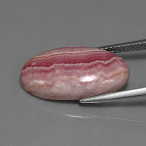 11.77カラットの天然マルチカラーロードクロサイト、オーバルカット、オペーク