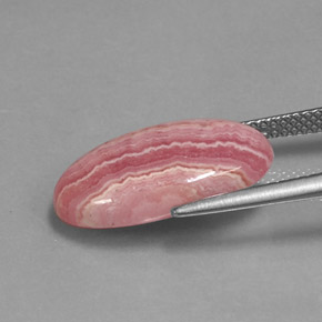 9.49カラットの天然マルチカラーロードクロサイト、オーバルカット、オペーク