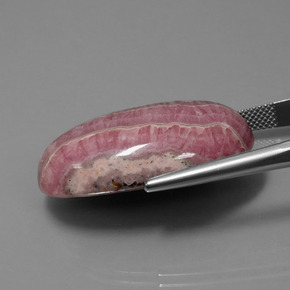 60.60カラットの天然マルチカラーロードクロサイト、オーバルカット、オペーク