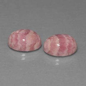 カラットの天然マルチカラーロードクロサイト（12.1×10.1 mm・オーバルカット）