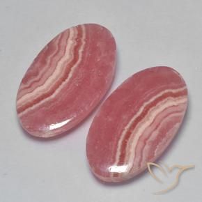 Shop natural 26.58ct マルチカラー ロードクロサイト gems, 楕円形, from 南アフリカ at GemSelect. In stock, global shipping!