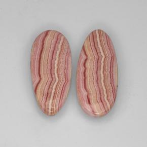 25.48カラットの天然マルチカラーロードクロサイト（24.3×10.6 mm・洋梨の形）