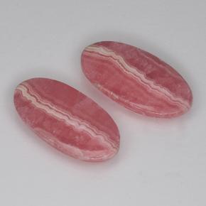 13.61カラットの天然マルチカラーロードクロサイト（19×9.6 mm・オーバルカット）