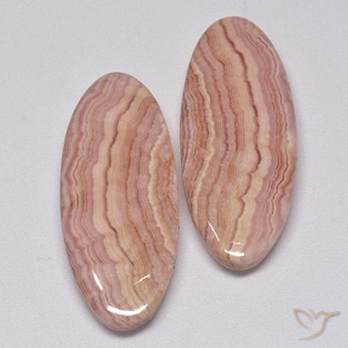 Shop natural 26.79ct マルチカラー ロードクロサイト gems, 楕円形, from 南アフリカ at GemSelect. In stock, global shipping!