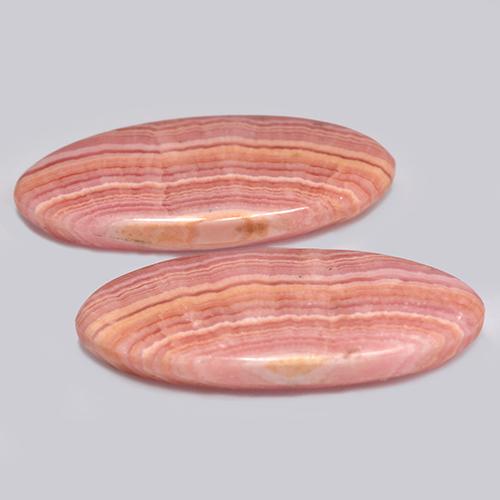24.12カラットの天然マルチカラーロードクロサイト（24.7×12 mm・オーバルカット）