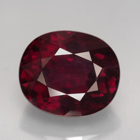 13.09カラットの天然パープルレッドロードライトガーネット（14×11.9 mm・オーバルカット）