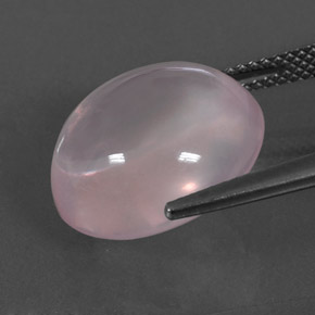 12.54カラットの天然ライトローズピンクローズクォーツ、オーバルカット、透明