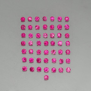 カラットの天然バイオレットレッドルビー（1.64 mm・ラウンドカット）