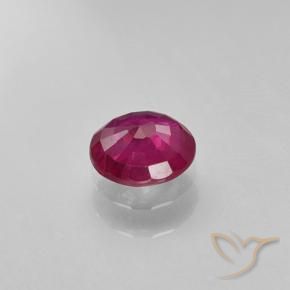 0.63カラットの天然ピンクがかったレッドルビー、ラウンド、VS-SI