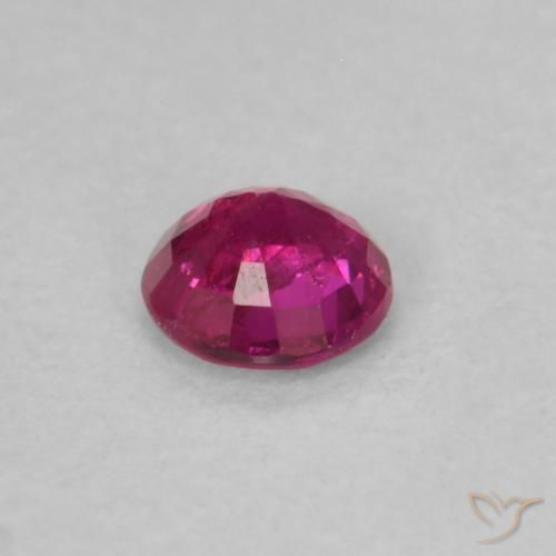 0.21カラットの天然赤みがかったピンクルビー、ラウンド、VS