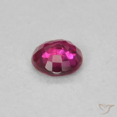 0.19カラットの天然ピンクがかったレッドルビー、ラウンド、VS