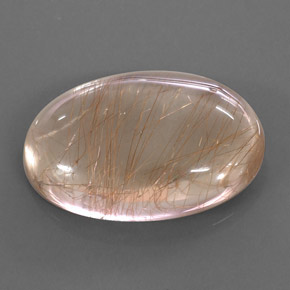 49.49カラットの天然無色＆ゴールドルチルクォーツ（30.6×21.4 mm・オーバルカット）