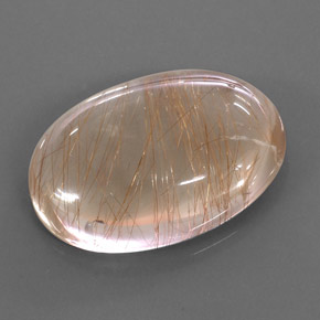 49.49カラットの天然無色＆ゴールドルチルクォーツ（30.6×21.4 mm・オーバルカット）