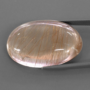 49.49カラットの天然無色＆ゴールドルチルクォーツ（30.6×21.4 mm・オーバルカット）