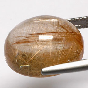 18.48カラットの天然無色＆ゴールドルチルクォーツ（17.3×14.3 mm・透明）