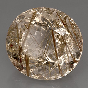 16.59カラットの天然無色＆ゴールドルチルクォーツ（17.2×16 mm・透明）
