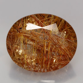 38.00カラットの天然無色＆ゴールドルチルクォーツ（24.9×20.7 mm・透明）
