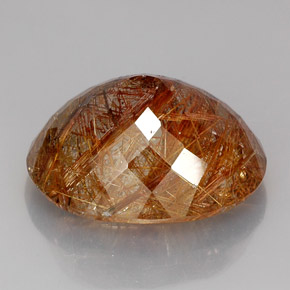 38.00カラットの天然無色＆ゴールドルチルクォーツ（24.9×20.7 mm・透明）