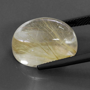 19.39カラットの天然無色＆ゴールドルチルクォーツ（18.3×13.2 mm・オーバルカット）
