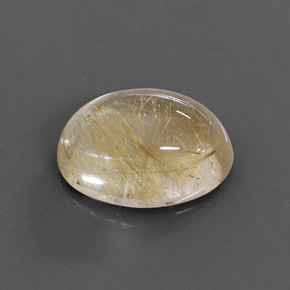 14.22カラットの天然無色＆ゴールドルチルクォーツ（18.2×13.4 mm・オーバルカット）