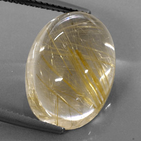14.80カラットの天然無色＆ゴールドルチルクォーツ（18.2×13.3 mm・オーバルカット）