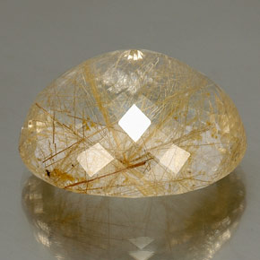 52.32カラットの天然無色＆ゴールドルチルクォーツ（26.2×23 mm・透明）