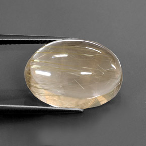 13.66カラットの天然無色＆ゴールドルチルクォーツ（18×13.3 mm・オーバルカット）