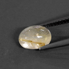 1.44カラットの天然無色＆ゴールドルチルクォーツ（8×6.1 mm・透明）